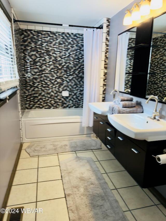 bathroom with tile patterned floors, shower / bath combo, and vanity