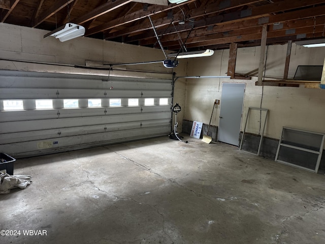 garage featuring a garage door opener