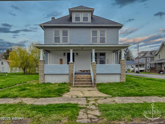 402 N Lincoln Ave, Jersey Shore, PA 17740 - american foursquare style home with covered porch and a front yard