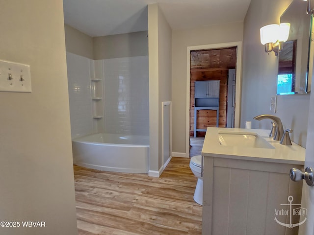 402 N Lincoln Ave, Jersey Shore, PA 17740 - full bathroom featuring wood finished floors, toilet, vanity, and baseboards