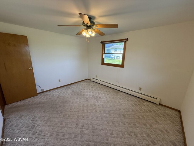 309 W Keller St, Lock Haven, PA 17745 - carpeted spare room featuring baseboard heating and a ceiling fan