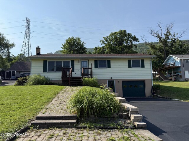 309 W Keller St, Lock Haven, PA 17745 - ranch-style home featuring an attached garage, asphalt driveway, a front yard, and a chimney
