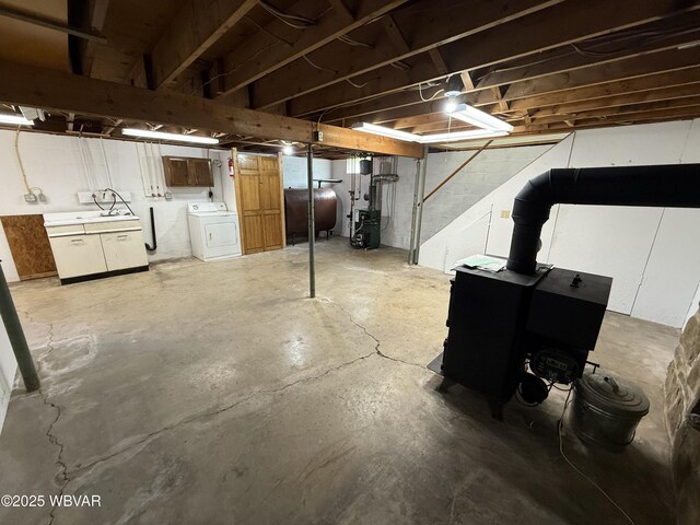 309 W Keller St, Lock Haven, PA 17745 - unfinished basement featuring heating fuel, washer / clothes dryer, and stairway