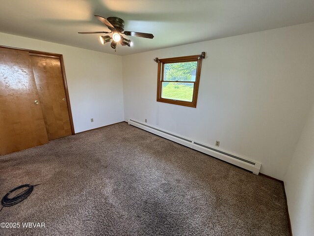 309 W Keller St, Lock Haven, PA 17745 - unfurnished bedroom featuring baseboard heating, carpet floors, and a ceiling fan