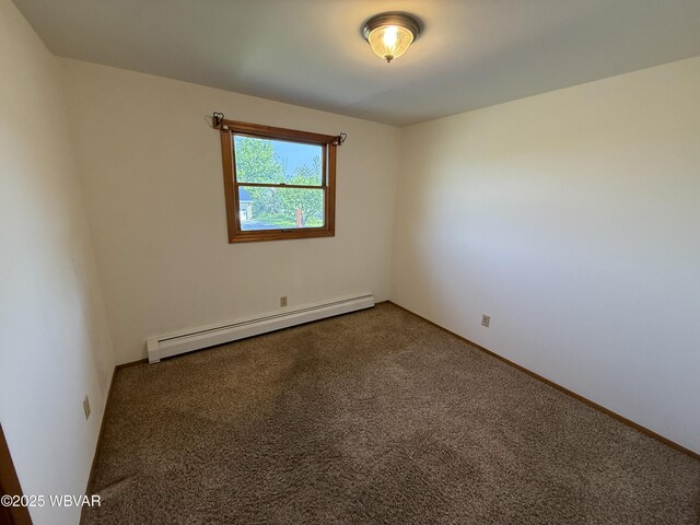 309 W Keller St, Lock Haven, PA 17745 - spare room featuring a baseboard radiator and carpet