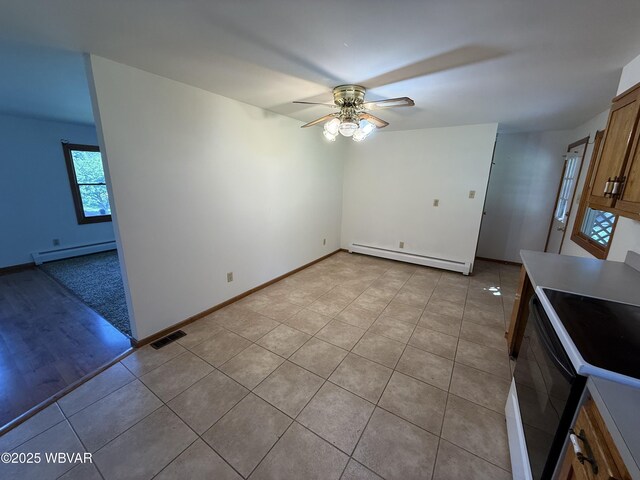 309 W Keller St, Lock Haven, PA 17745 - unfurnished living room featuring a baseboard heating unit, light tile patterned flooring, and a ceiling fan