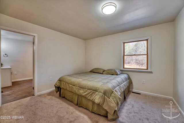 entryway with light hardwood / wood-style floors