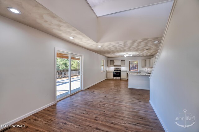 bathroom featuring wood-type flooring and walk in shower