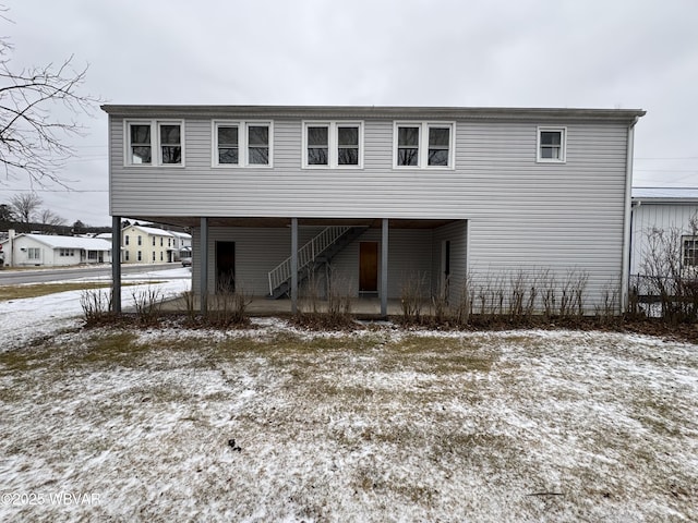 view of snow covered house