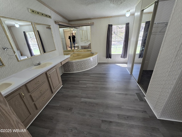 1592 Cement Hollow Rd, Jersey Shore, PA 17740 - bathroom with a bath, wallpapered walls, visible vents, and ornamental molding
