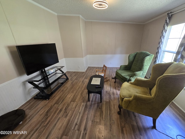 1592 Cement Hollow Rd, Jersey Shore, PA 17740 - living room featuring wainscoting, crown molding, wood finished floors, and a textured ceiling