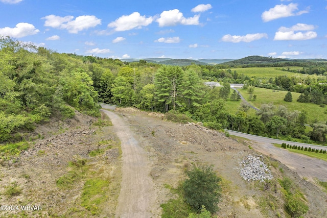 view of road featuring a rural view