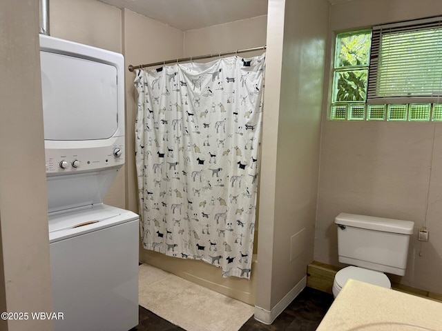 61 W Houston Ave, Montgomery, PA 17752 - full bath featuring estacked washer and dryer, shower / bathtub combination with curtain, and vanity