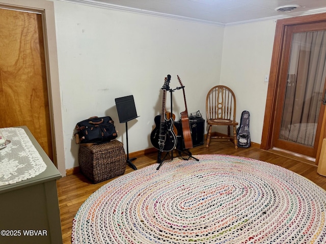 61 W Houston Ave, Montgomery, PA 17752 - sitting room featuring wood finished floors and crown molding