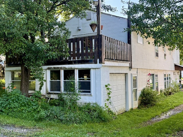 61 W Houston Ave, Montgomery, PA 17752 - rear view of house featuring a garage