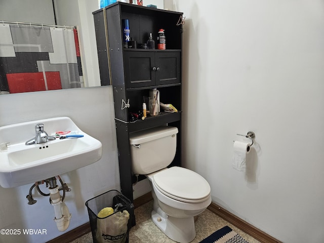 93 Woodside Rd, Danville, PA 17821 - full bathroom with toilet, baseboards, and a sink