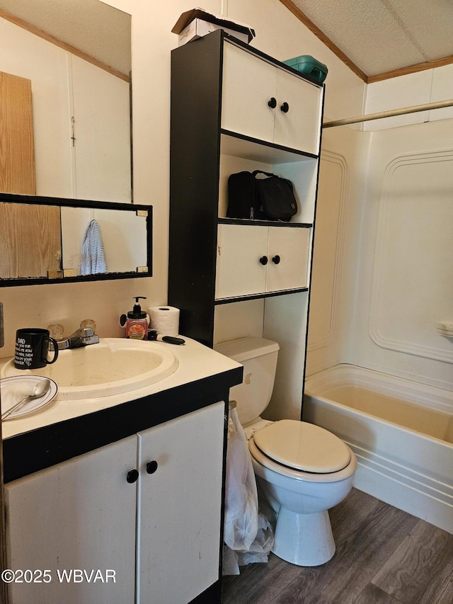 93 Woodside Rd, Danville, PA 17821 - bathroom with toilet, vanity, wood finished floors, shower / bath combination, and crown molding