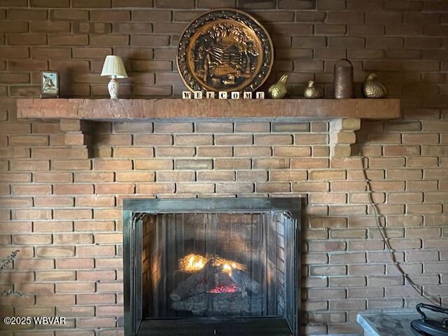 interior details with a fireplace