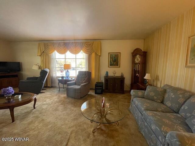 living room featuring carpet and wooden walls