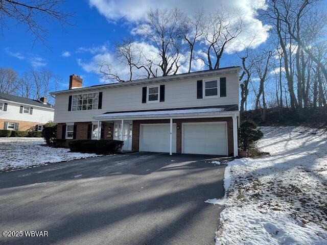 view of front property with a garage