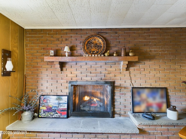 room details with wood walls and a fireplace