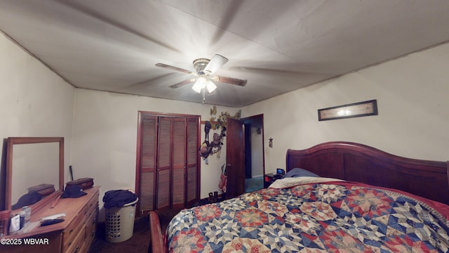 bedroom with ceiling fan, a closet, and carpet floors