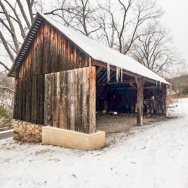 view of home's community with an outbuilding