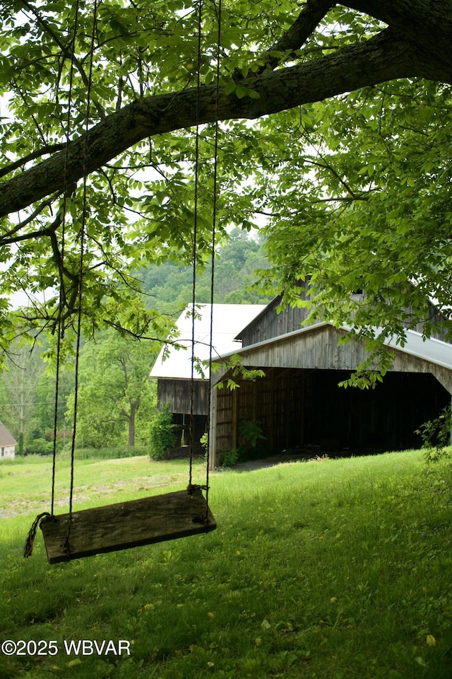 106 Cresent Hill Rd, Cogan Station, PA 17728 - view of green lawn featuring an outdoor structure