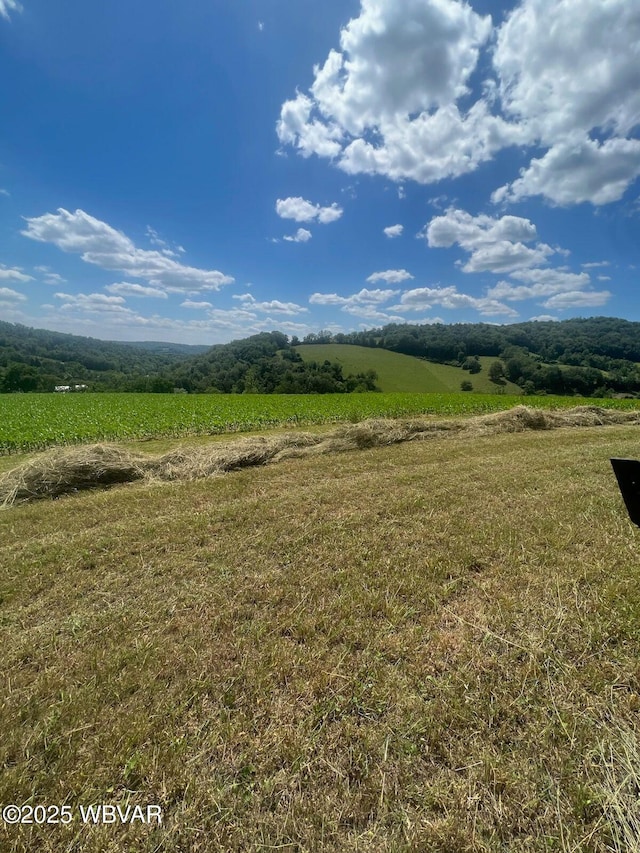 view of mountain feature with a rural view