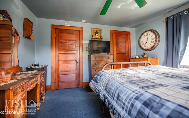 carpeted bedroom featuring ceiling fan