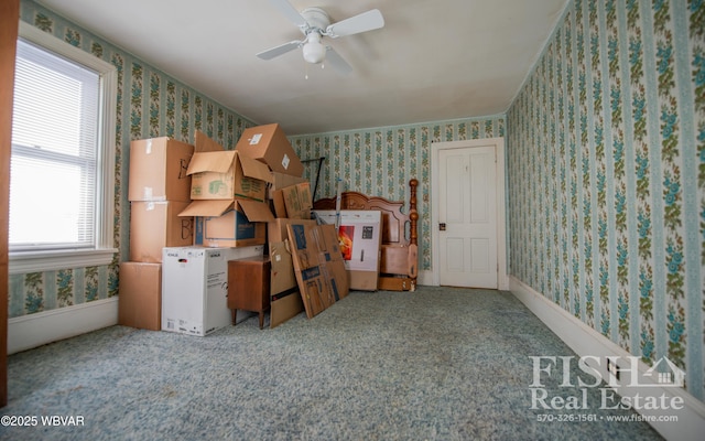 interior space with ceiling fan