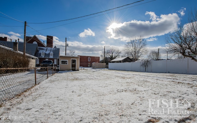 view of yard covered in snow