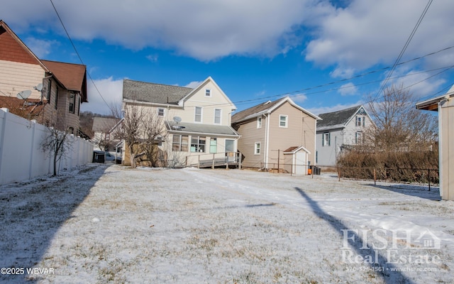 view of snow covered property