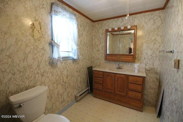 bathroom with vanity, a baseboard heating unit, ornamental molding, and toilet