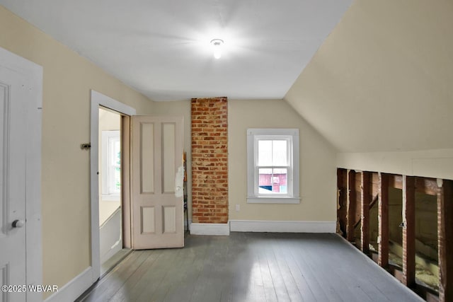 2177 N Williamson Rd, Covington, PA 16917 - additional living space with hardwood / wood-style flooring, baseboards, and vaulted ceiling