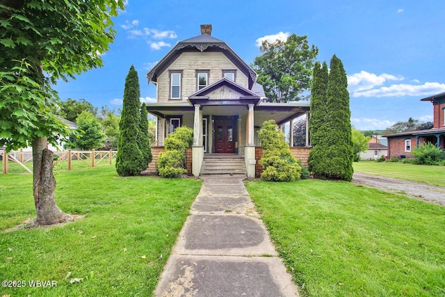 2177 N Williamson Rd, Covington, PA 16917 - victorian home featuring a porch and a chimney