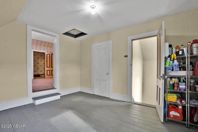 2177 N Williamson Rd, Covington, PA 16917 - interior space with dark wood-style floors and baseboards