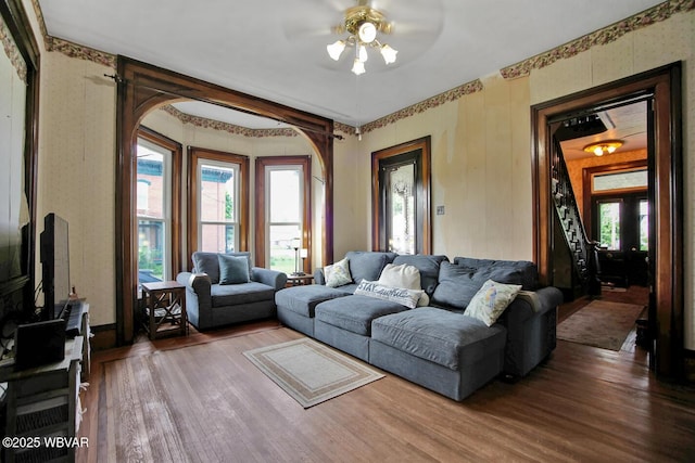 2177 N Williamson Rd, Covington, PA 16917 - living room with a ceiling fan, wood finished floors, plenty of natural light, and arched walkways
