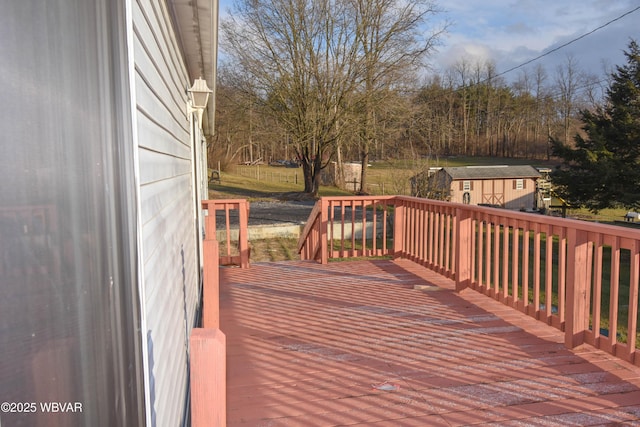 deck featuring a storage unit