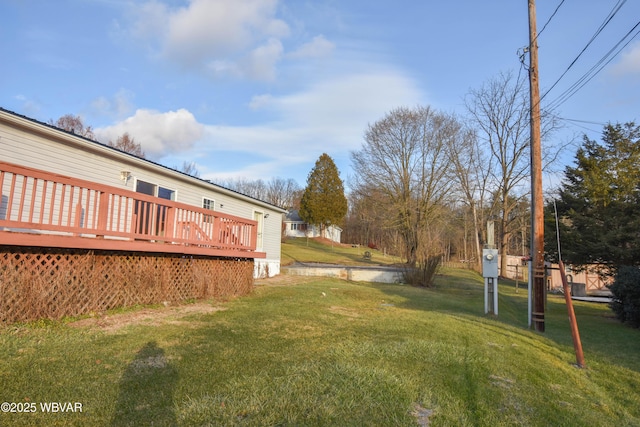 view of yard featuring a deck