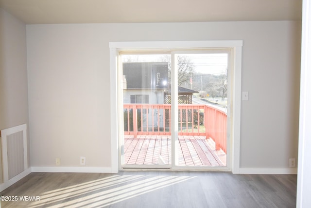 interior space with hardwood / wood-style flooring