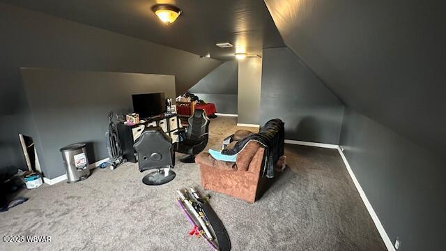 bonus room with carpet floors, lofted ceiling, and baseboards