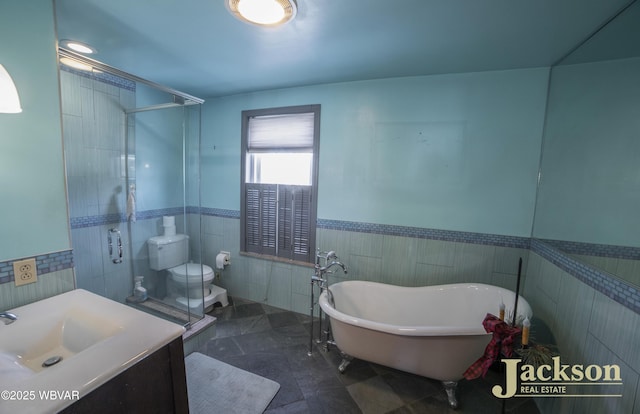 full bathroom featuring toilet, vanity, tile walls, and shower with separate bathtub