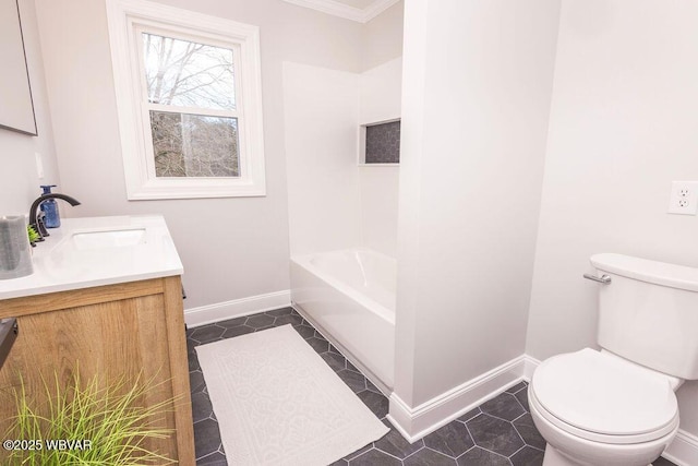 full bathroom featuring tile patterned flooring, toilet, vanity, baseboards, and a bathtub