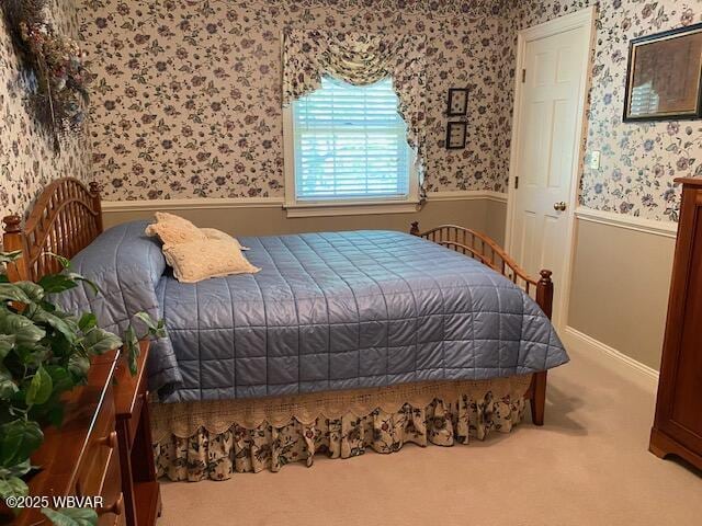 1550 Campbell St, Williamsport, PA 17701 - carpeted bedroom with a wainscoted wall and wallpapered walls