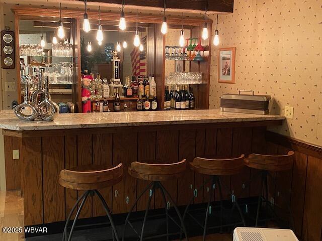 1550 Campbell St, Williamsport, PA 17701 - bar with hanging light fixtures and a bar