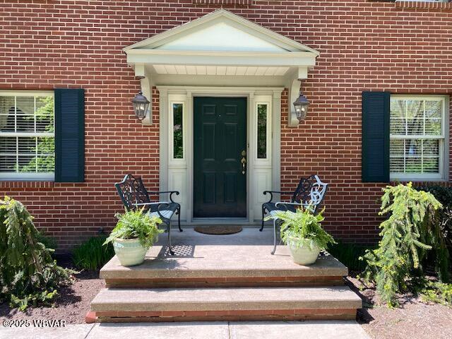1550 Campbell St, Williamsport, PA 17701 - doorway to property with brick siding