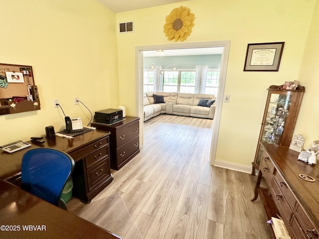 2035 Woodland Rd, Montoursville, PA 17754 - home office with light wood-style flooring and baseboards