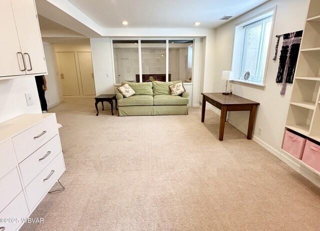 2035 Woodland Rd, Montoursville, PA 17754 - living room with light carpet, baseboards, and recessed lighting