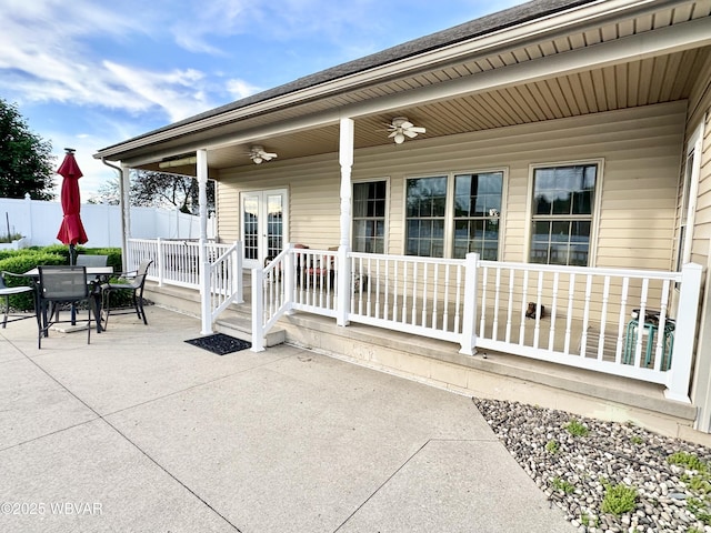 2035 Woodland Rd, Montoursville, PA 17754 - view of patio featuring fence, outdoor dining space, and french doors
